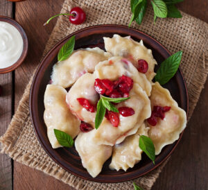 Delicious dumplings with cherries and jam.